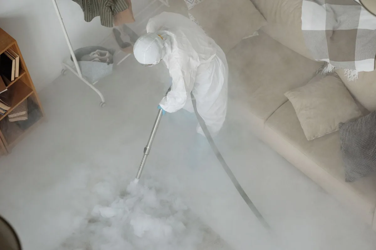 Biohazard cleanup technician in protective equipment, The Crossings, FL